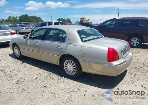 2004 Lincoln Town Car Signature из США, поврежденный, VIN 1LNHM81W74Y650763